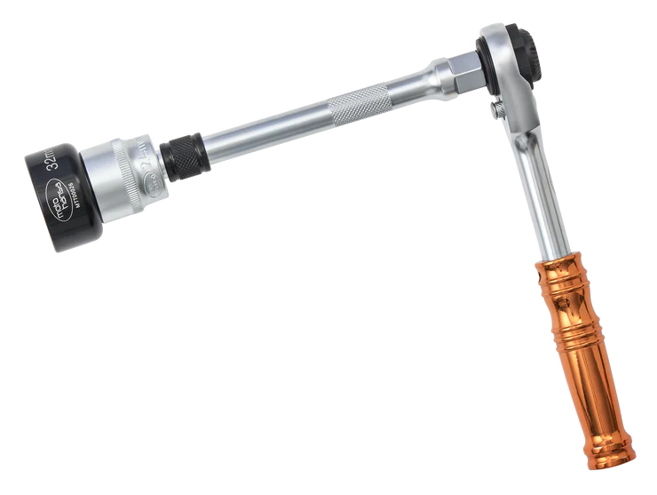 Torque wrench with orange handle on a white background