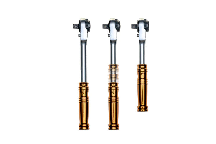 Three ratchets with gold accents on a white background