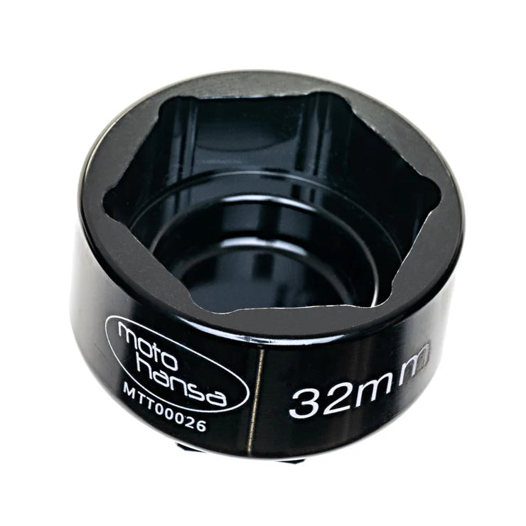 Black metal tool with 'moto hansa' branding and '32mm' marking on a white background