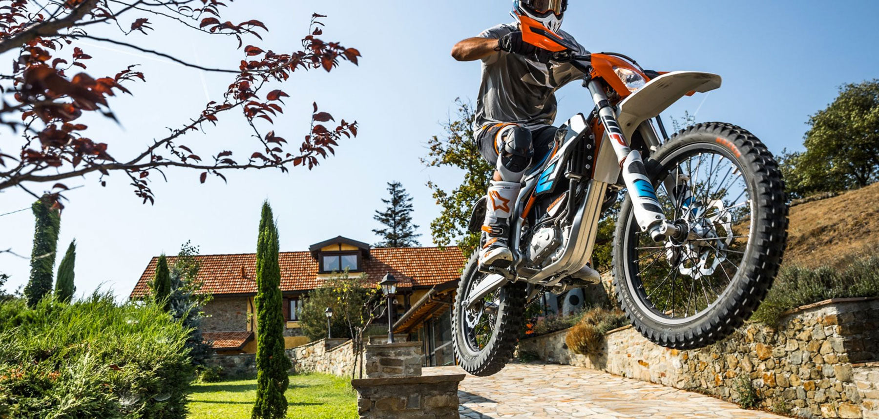 KTM E-Ride jumping off house wall
