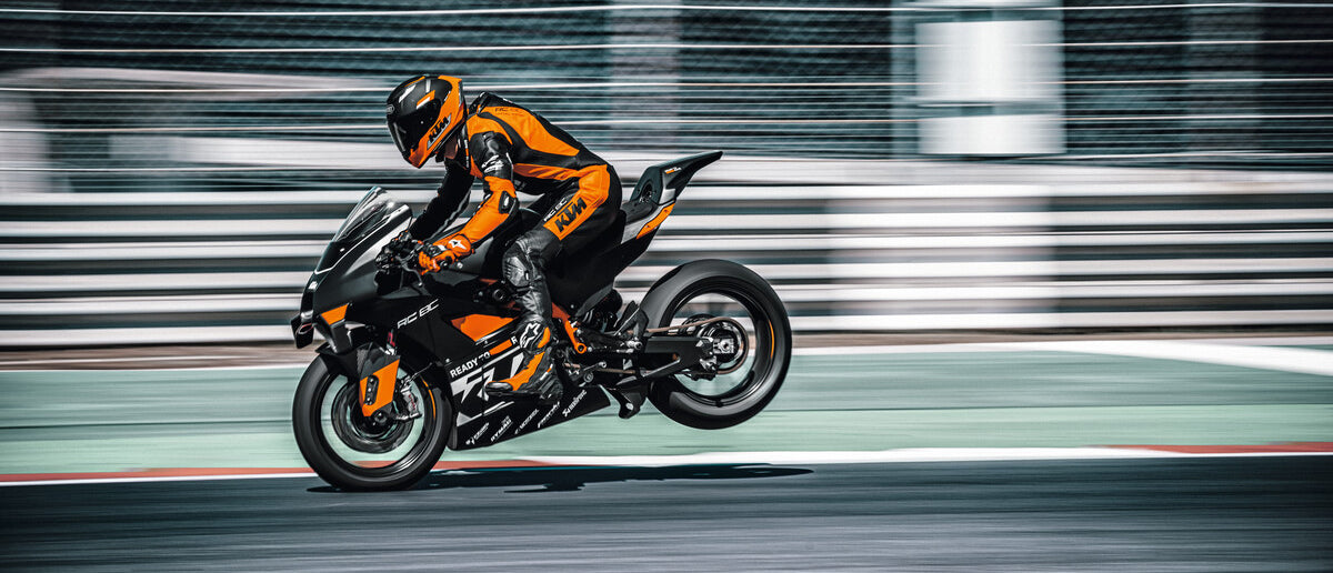 KTM Supersport Motorcycle on it's front wheel braking