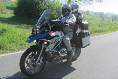 Passenger footrest relocation