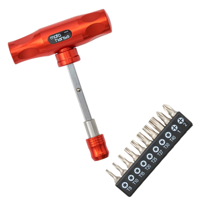 Red tool with multiple drill bits on a white background