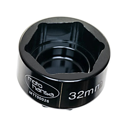 Black metal tool with 'moto hansa' branding and '32mm' marking on a white background